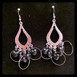 Silver earrings with black dangle hearts